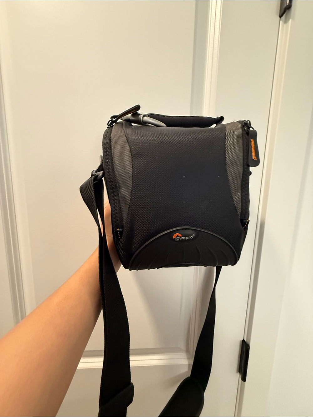 Lowepro crossbody camera bag with waterproof cover